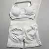 En Stock Dfyne Mismo Estilo Conjunto de Yoga de Alta Elasticidad Sujetador Halter y Conjunto de Shorts Conjunto de Yoga Fitness sin Costuras