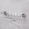Nuevo gancho de ventosa giratorio de lujo ligero con forma de fila, gancho de ondulación de agua, sin perforaciones, fuerte capacidad de carga, gancho para baño y cocina