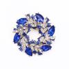 Europa y Estados Unidos nuevo broche de cristal de moda pin femenino explosión moda color colgante corsage accesorios venta al por mayor fábrica