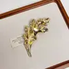 Personalidade Europeia e Americana Sentido Avançado Celebridade da Internet Broche de Folha de Metal Sentido Avançado Tendência Retrô Luxo Leve Único Elegante Corsage