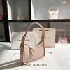 Dropshipping Bolso de Axila Rosa de Luna Creciente de Nicho de Gama Alta 2025 Nuevo Bolso Versátil tipo Baguette para Hombro al por Mayor