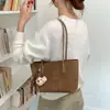 Bolso cubo tejido de estilo retro transfronterizo, de alta gama, con textura mate, nueva colección otoño/invierno 2026, moderno y práctico para el trabajo, bolso de hombro o de axila