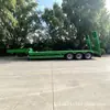 La fábrica exporta semirremolque de plataforma baja de 3 ejes para transporte de artículos grandes, semirremolque de plataforma baja para transporte de maquinaria de ingeniería