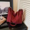 Bolso de Lona Versátil Personalizado de Gama Alta para el Trayecto Diario 2026 Nuevo Bolso Cruzado de Moda Casual Multiusos para Mujer