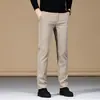 Pantalones casuales de primavera y otoño para hombre, estilo recto holgado, modernos y versátiles, adecuados para negocios y moda, pantalones largos negros elásticos para hombres jóvenes