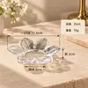 Creativos platitos transparentes de vidrio con forma de pétalo, ideales para servir té, bocadillos, frutas secas y postres; cuencos para mojar y cuencos para fruta con borde dorado para uso doméstico y comedores de hotel