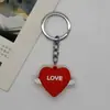 Colgante creativo de corazón 3D tridimensional de pegamento suave de PVC para parejas, bolsa, regalo pequeño, llavero, colgante, fabricantes, venta al por mayor directa