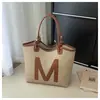 Bolso de hombro casual grande de estilo vintage de principios de primavera 2026 con letra simple nuevo moderno para mujer