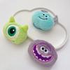 Lindo broche de monstruo de lana azul de dibujos animados verde de ojos grandes, accesorios colgantes para mochila escolar, muñeco de peluche morado de boca grande