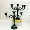 Candelabro de metal de estilo europeo, creativo, retro, para hotel, hogar, mesa de comedor, decoración romántica para bodas, candelabro de tres cabezas y cinco cabezas.