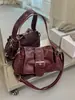 Bolso de Motocicleta Retro de Nicho Bajo el Brazo para Mujer 2026 Nuevo Estilo Bolso de Mano de Alta Gama Versátil Bolso de Hombro Cruzado