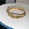 Pulsera Redonda Abierta Geométrica Multicapa Incrustada de Diamantes Pulsera Metálica Transfronteriza Europea y Americana Pulsera Joyería de Lujo Ligero de Alta Gama