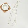 Nl-128 Collar de Trébol de Cuatro Hojas de Goteo de Aceite de Doble Capa Apilado Largo Moda Versátil Cadena para Suéter Accesorios de Otoño e Invierno Venta al por Mayor
