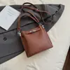Bolsos Retro de Nicho de Moda para Mujer Invierno 2025 Nuevo Bolso Cruzado Casual Elegante Bolso de Mano de Alto Valor Bolso Cubo