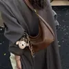 Bolso Cruzado Simple y Relajado Estilo Coreano Tipo Dumpling para Mujer 2025 Invierno Nuevo Bolso de Hombro Retro de Gran Capacidad para Viajes