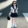 Chal para niña, conjunto de falda plisada de manga corta 2026, nuevo estilo de verano, conjunto de tres piezas JK estilo universitario para niños
