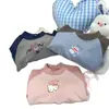 Moda Coreana Otoño e Invierno 2026, Tops Térmicos de Moda para Niños y Niñas, Bloques de Color, Color Sólido, Diseño de Dibujos Animados del Gato Kt para Bebés y Niños