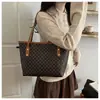 Bolso tote de gran capacidad para mujer, nuevo diseño versátil de nicho, bolso de hombro único para mujer, bolso de trabajo, bolso de mano de moda para dama