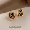 Pendientes Pequeños de Leopardo para Mujer de Principios de Otoño, Pendientes Sencillos y de Moda Estilo Hong Kong para el Trabajo, Pendientes Normcore de Diseño Nicho