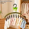 Colgador de ropa lindo con forma de cebolla verde, divertido, con múltiples pinzas para uso doméstico, adecuado para secar calcetines y ropa interior, estante multifuncional de almacenamiento y secado