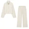 Venta al por mayor transfronteriza 2026 Moda europea y americana holgado con cremallera chaqueta suave + conjunto de pantalones ropa de mujer E5260610