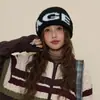 Al por mayor 25 Años Otoño e Invierno Nuevo Disparo Real Gorro de Punto Protección para Orejas Adelgazamiento Facial Gorro para el Frío Gorro Cálido Gorro Frío Moda