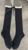 Calcetines Lolita lindos para niña con borde de encaje en color blanco lechoso con rayas verticales, calcetines de media pantorrilla adelgazantes con lazo, calcetines largos apilados
