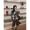 ¡Artículos de calidad de Guangzhou Shisanhang! Suéter tejido de estilo retro para mujer Otoño 2026