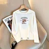 Bestseller de Almacén Lightning Marca de Moda Camiseta de Manga Larga para Mujer 2026 Otoño Invierno Holgada Gato Versátil Top de Pareja Transfronterizo Comercio Exterior