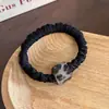 1. Goma para el pelo vintage de flores oscuras con una textura madura y suave, adecuada para ir al trabajo, accesorio para el cabello duradero y versátil para mujeres