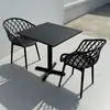 Juego pequeño de mesa y sillas redondas de acero al carbono simple para ocio en balcón, mesa de discusión, área de descanso, mesa de comedor para cafetería de té con leche al aire libre