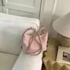Bolso de moda coreana elegante para mujer con estampado de lichi, bolso tipo dumpling, nuevo bolso de hombro y cruzado simple de verano 2026 para el día a día