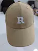 Nuevo logo R estilo de circunferencia de cabeza grande estilo visera estilo pareja versátil popular bordado de letras gorra de béisbol adelgazante de cara letra béisbol
