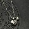 Joyería de moda Plata tailandesa Retro Corazón de doble melocotón Collar de tumba Cadena de suéter Otoño e Invierno Personalizado de Europa y América Cruz de Alta Gama