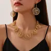 Collar elástico de diseño de nicho de venta caliente transfronterizo, circular hueco geométrico, metal vintage europeo y americano, venta al por mayor desde el fabricante