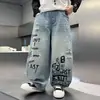 Estilo Nuevo de Primavera Jeans para Niños Ropa Infantil Niños Niños Adolescentes Versátil Pantalones de Mezclilla con Letras Rasgados Modernos