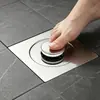 Desagüe de Piso de Baño de Acero Inoxidable Activado con el Pie Dispositivo Anti-Olor con Núcleo Pop-Up Tipo Prensa y Tapa de Sellado Anti-Retorno