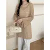 Foto real de cárdigan de punto casual holgado de manga larga estilo coreano, nuevo top largo de punto hueco de moda para mujer de primavera y otoño