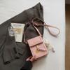 Bolso de hombro sencillo y popular para mujer, nuevo estilo coreano de 2025, con costuras a la moda, bolso para teléfono móvil, bandolera estilo occidental, pequeño bolso cuadrado.