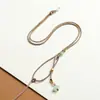 Elegante Colgante Cuerda DIY Tejido a Mano Asimétrico Colgante Pequeño Loto Dosel Esmaltado Cuerda de Cuello Nueva Cuerda de Collar