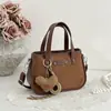 Bolsa de ombro grande de camurça 2026 para o dia a dia de mulheres, moda de nicho de alta qualidade, bolsa tote de pelúcia cor sólida