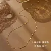 Versátil y que conserva el color, collar minimalista de lujo ligero bañado en oro de 14 quilates para mujer, nueva tendencia 2026, cadena para clavícula con lentejuelas a la moda