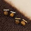 Pendientes de color Maillard otoño e invierno Nuevos pendientes retro de piedra de ojo de tigre de moda pendientes de lujo ligeros de una sola palabra geométricos simples