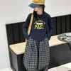 Conjunto de Camisetas de Primavera y Otoño para Niñas 2026 Nuevo Estilo Conjunto de Primavera para Niña Grande Pantalones Cuadros Casuales Conjunto de Dos Piezas Moderno