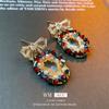 Aretes Ovalados de Cristal Perla Lazo Zircón Aguja de Plata Aretes Elegantes de Lujo Accesible a la Moda Aretes Nicho Personalizados para Mujer