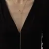 Cadena de suéter de transferencia geométrica de acero de titanio elegante cuenta redonda tirador collar largo para mujer simple nicho accesorios para camisa básica moda