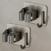 Soporte de mopa para baño de acero inoxidable, estante de almacenamiento, clip de pared, sin taladro, adhesivo fuerte, colgador de escoba, venta al por mayor