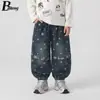 Colección de otoño de Beiteng: pantalones de mezclilla elegantes para niños, pantalones largos modernos y a la moda para bebés, estilo coreano, holgados y casuales para niños