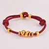 2025 Tienda de Oro Mismo Estilo Arena Dorada Rollo Serpiente Cuerda Roja Pulsera Nueva para Mujer Serpiente Retorcida Cuerda de Mano Serpiente del Zodiaco