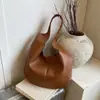 Bolsa Tote Retrô Estilo Preguiçoso 2025 Novo Estilo Simples Grande Capacidade High-End Moda Feminina Versátil Bolsa de Ombro de Axila